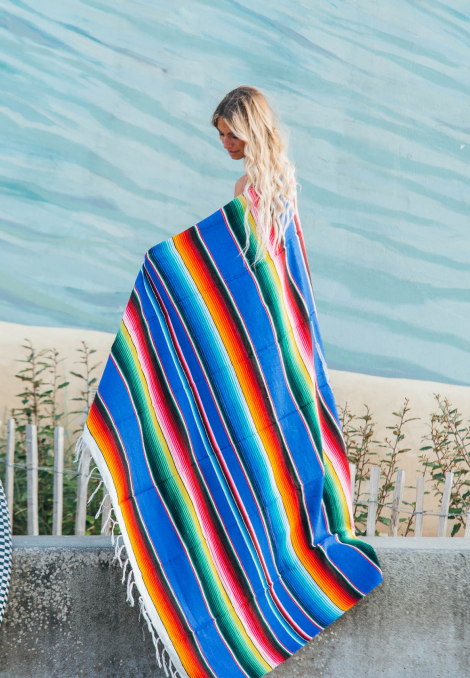 mexican blanket or Ethnic blanket with a striped pattern in French blue