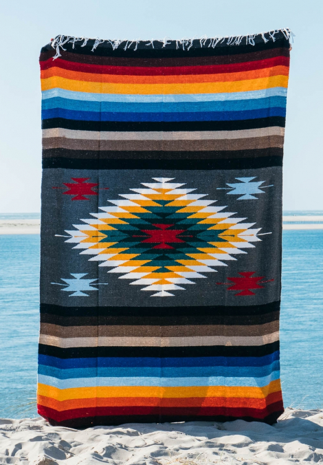 Mexican blanket or beach rug in grey and multicolor tribal patterns