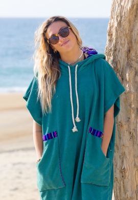 girl with green towel surf poncho