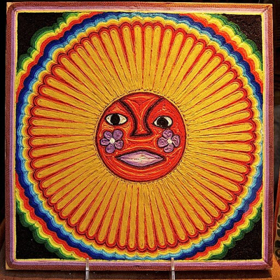 512px-Huichol_string_art_sun
